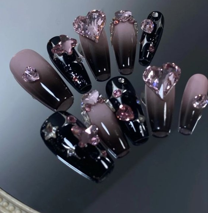 Extremely luxurious black and pink nail design with stones