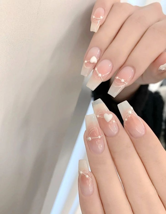 Pale pink jelly nails with beautiful shapes
