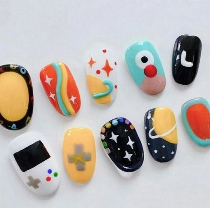 Loveliness and cuteness on every finger with cartoon nail art