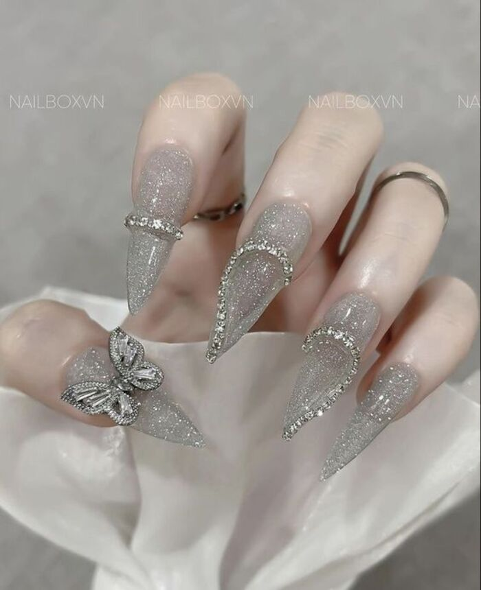2024 nail design sparkles with luxurious bows