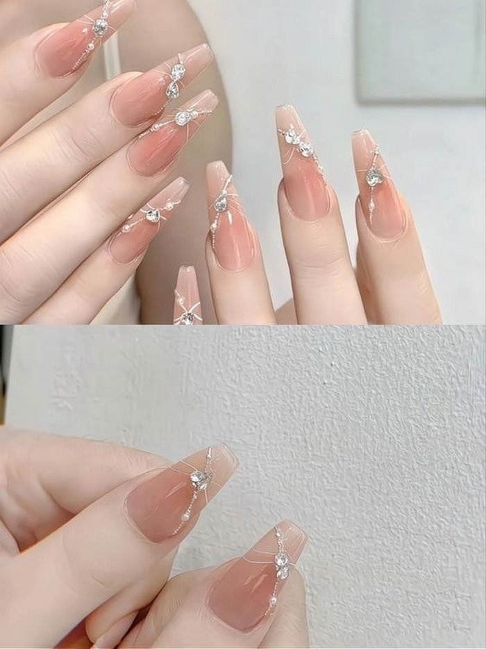 Pink nails with delicate small stones