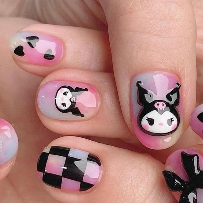Cartoon-drawn nails, bringing a sweet and cute atmosphere.