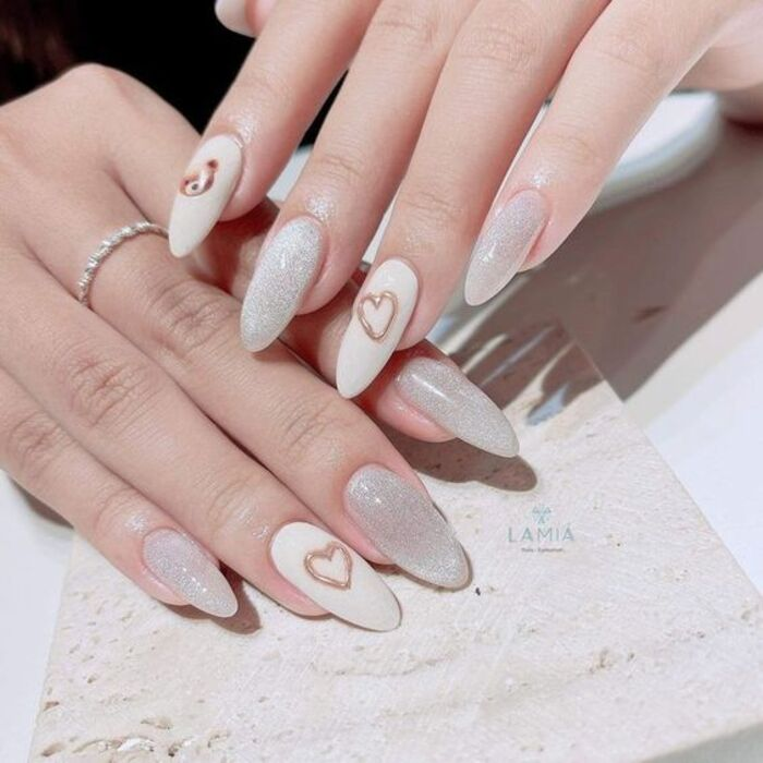 Beautiful white nail style with cat eye