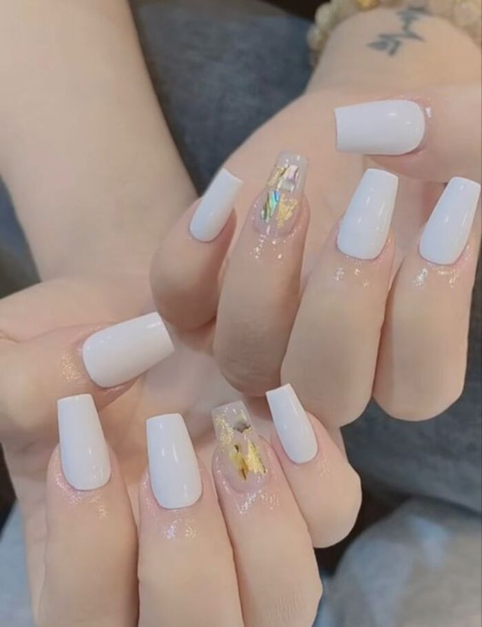 Impressively beautiful white bridal nails