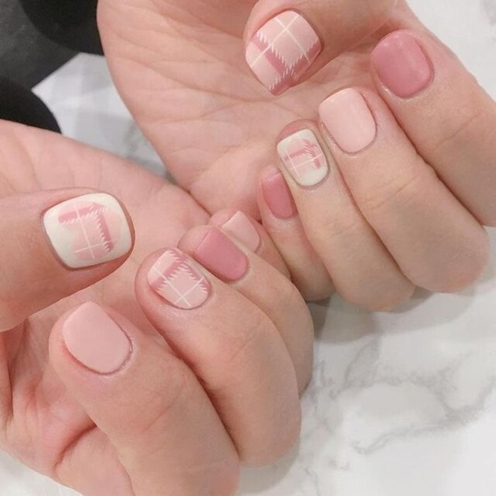 Simple round pink and white nail design