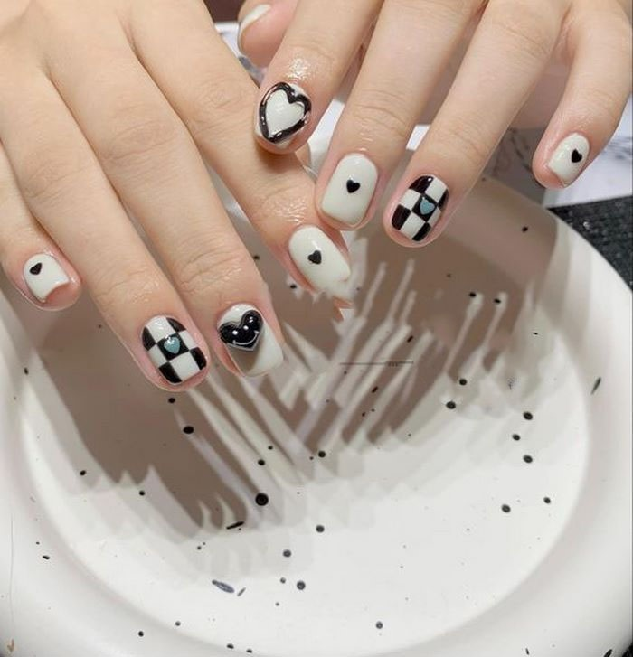 Simple black and white nails for her