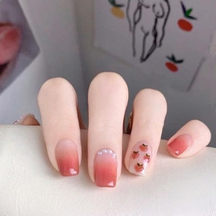 Youthful pink nail design with stones for girls