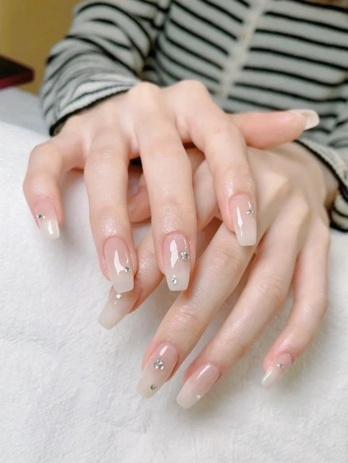 Pink nails make her more feminine