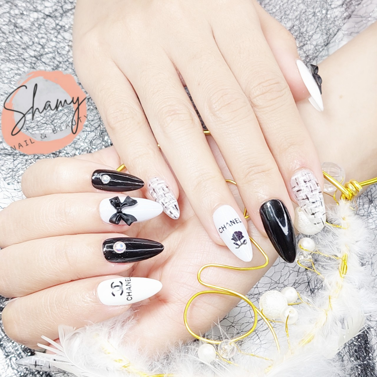 Elegant chanel-inspired nail designs with elegant styling — design 23
