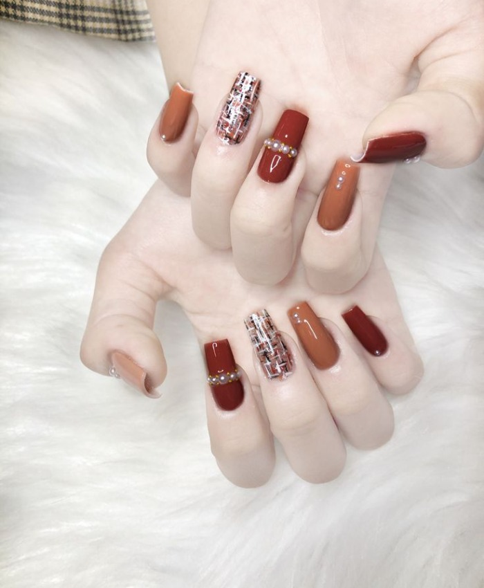 Mẫu nail cam đậm nhạt đính ngọc trai quyến rũ và trưởng thành