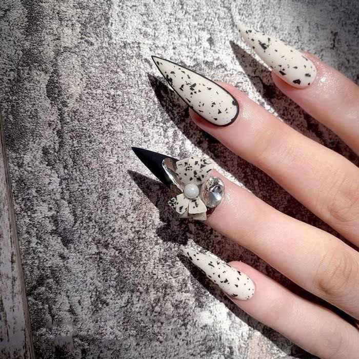 Super beautiful long pointed white and black nail design