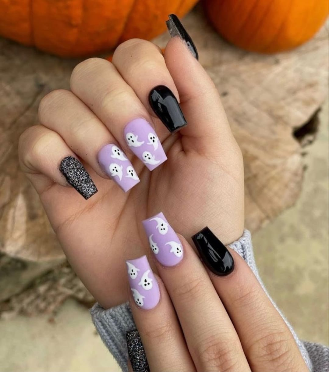 Discover a unique collection of Halloween nail designs, turning your hands into magical works of art