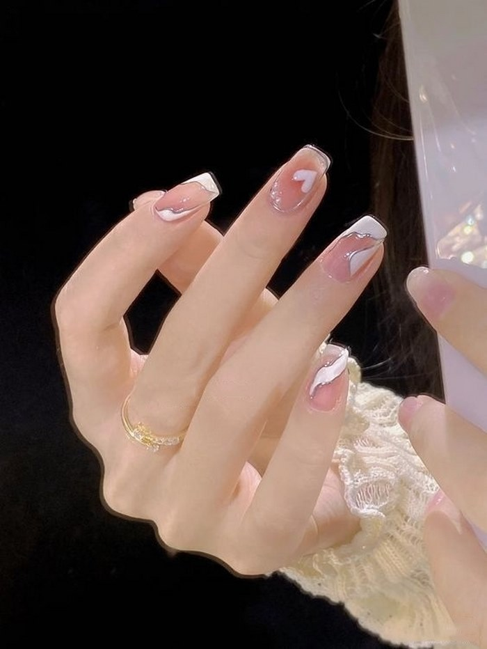 Soft pink jelly nail designs with heart motifs — design 23