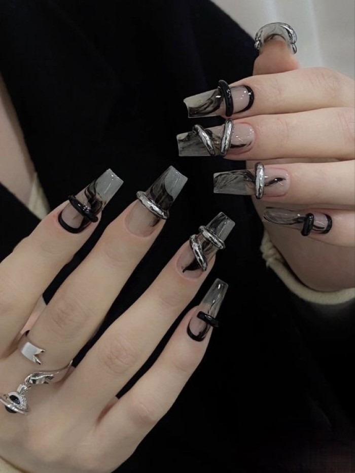 Chic black nail designs with long nails, black accents — design 42