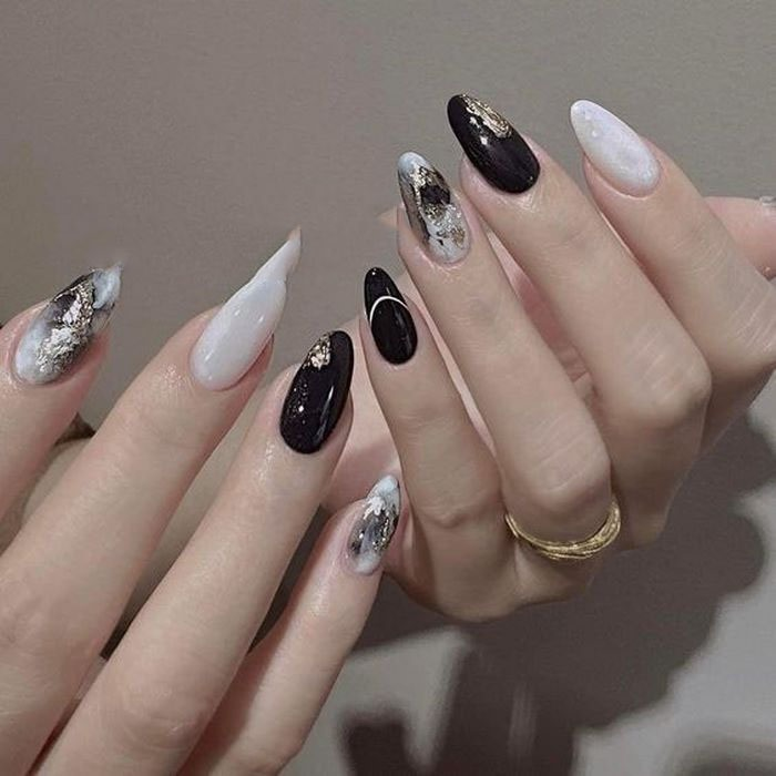 Black and white nails are classy and sophisticated