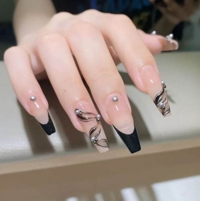 Chic black nail designs with pink accents, black accents, minimal styling — design 41