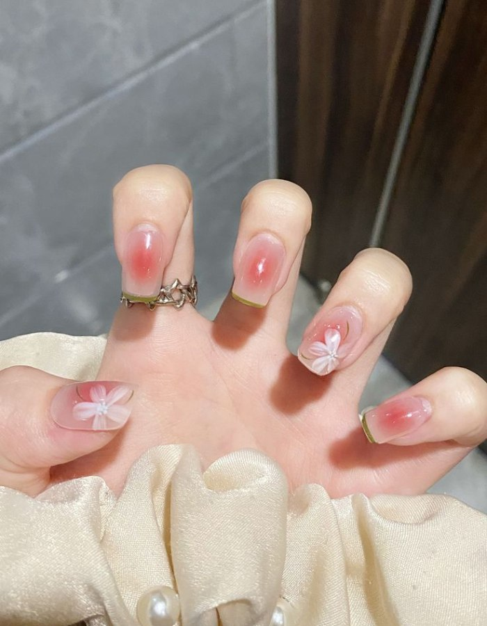 Beautiful nail design in elegant floral rhinestone color