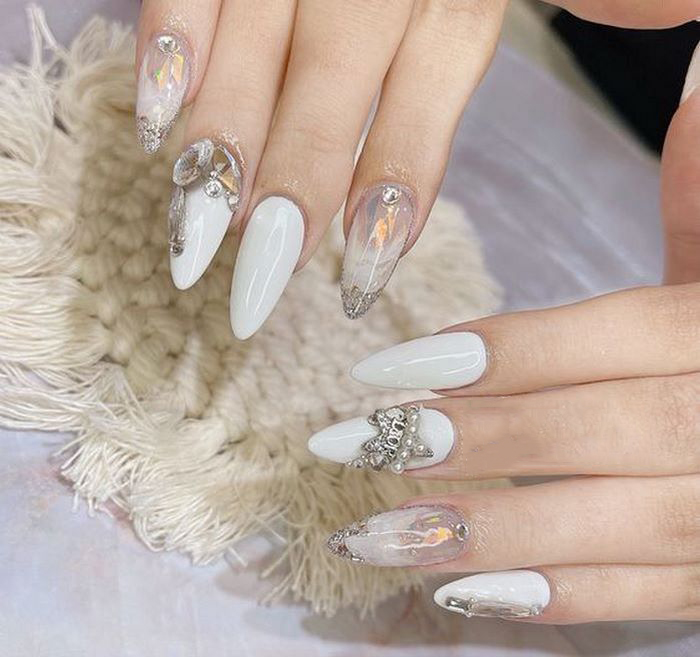 Suggested white nail design that stands out with luxurious rhinestones