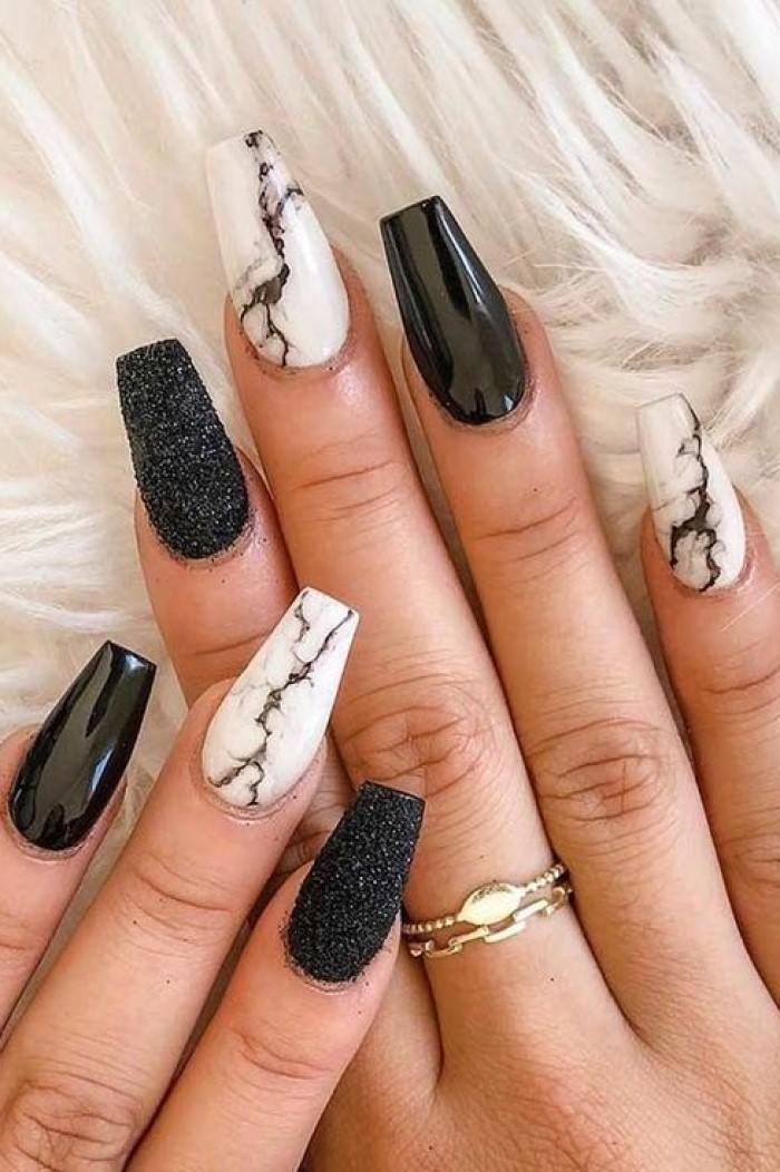 Chic black and white nail design mixed with black