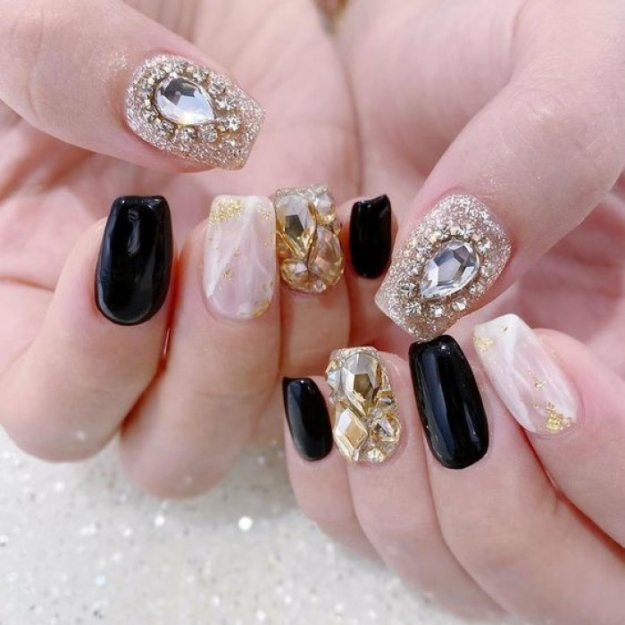 Chic black nail designs with black accents — design 11