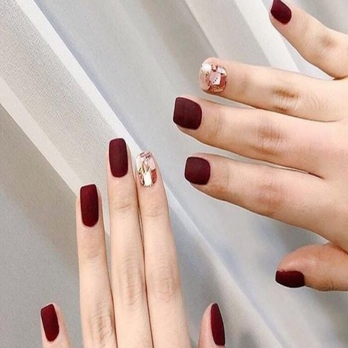 Extremely classy short red nail design
