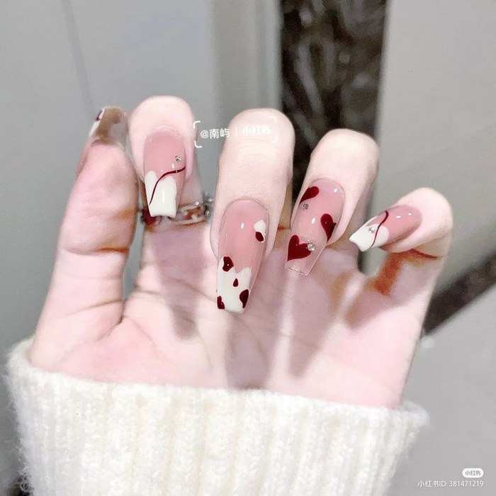 Extremely bright skin with pink nails with stones