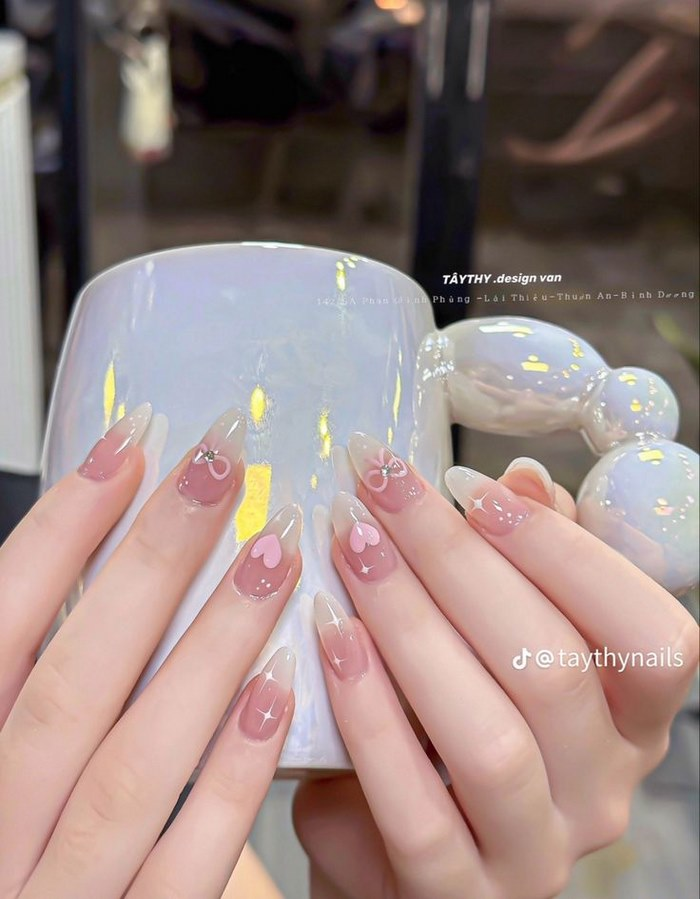 Soft pink jelly nail designs with heart motifs, pink accents — design 74