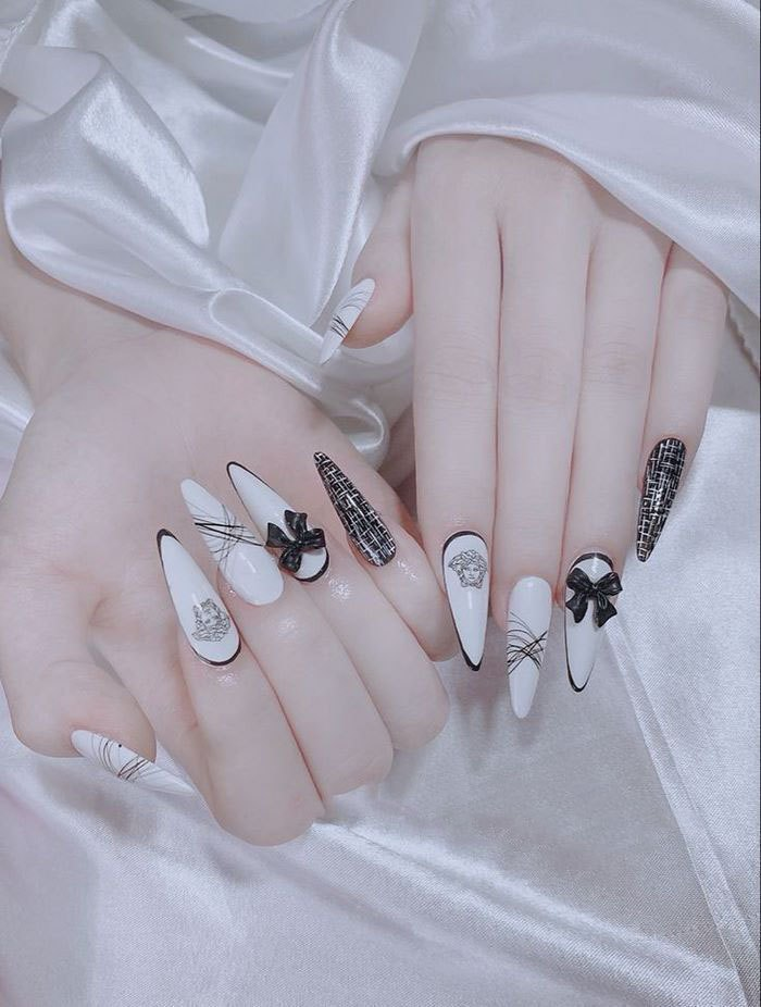 The most prominent black bow nail polish