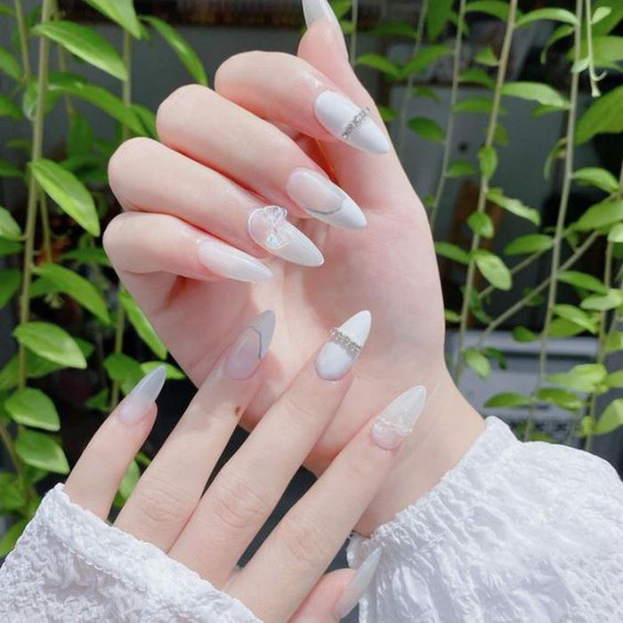 Collection of white pointed nail designs for your reference