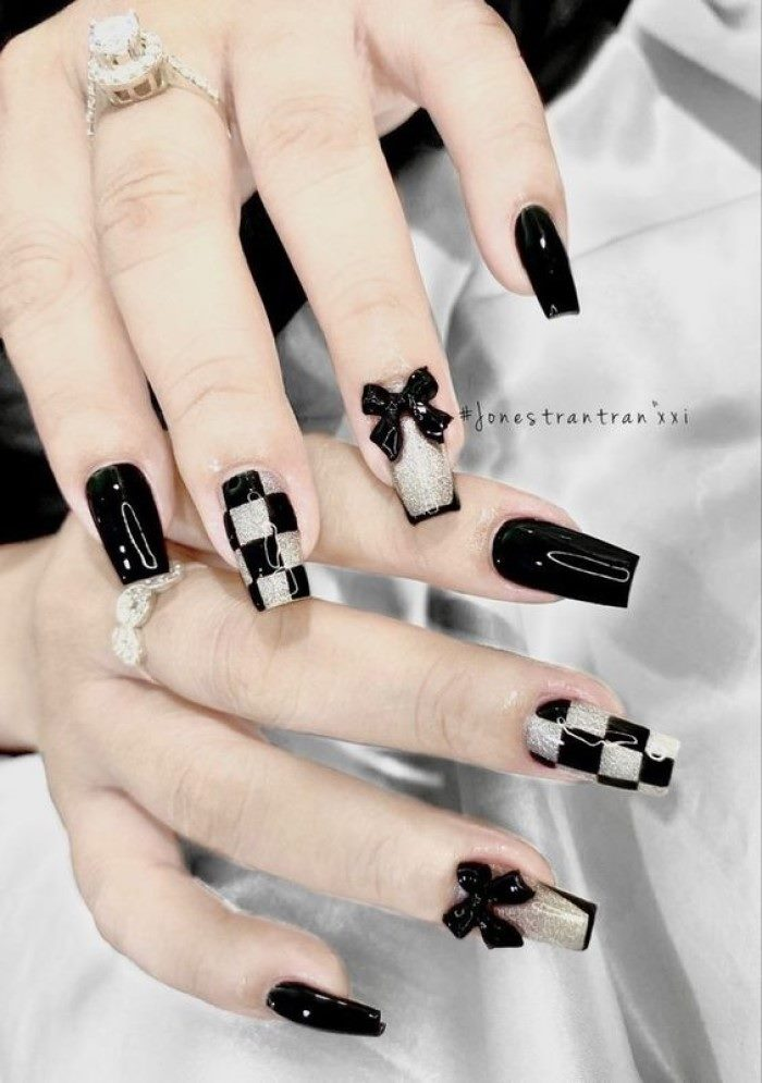 Chic black nail designs with black accents, elegant styling — design 15
