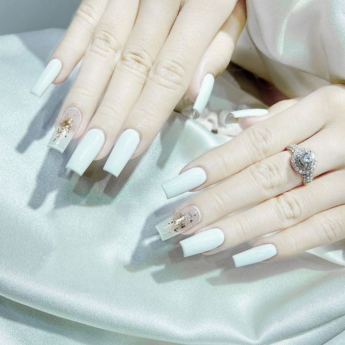 Unique, outstanding white square nails combined with patterns