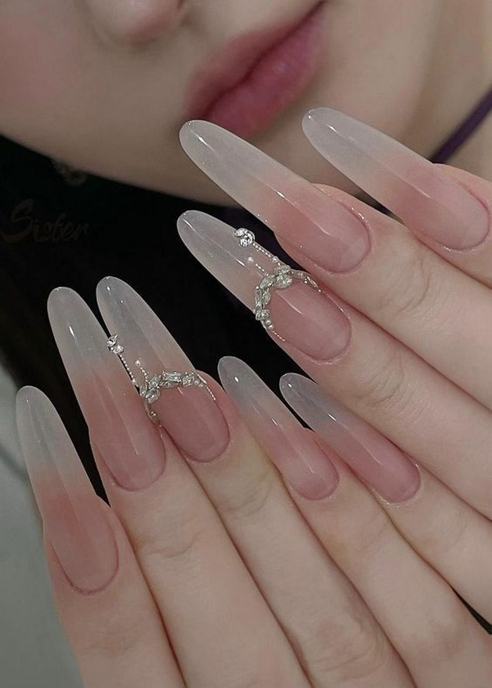 Soft pink jelly nail designs with rhinestones, pink accents, elegant styling — design 17