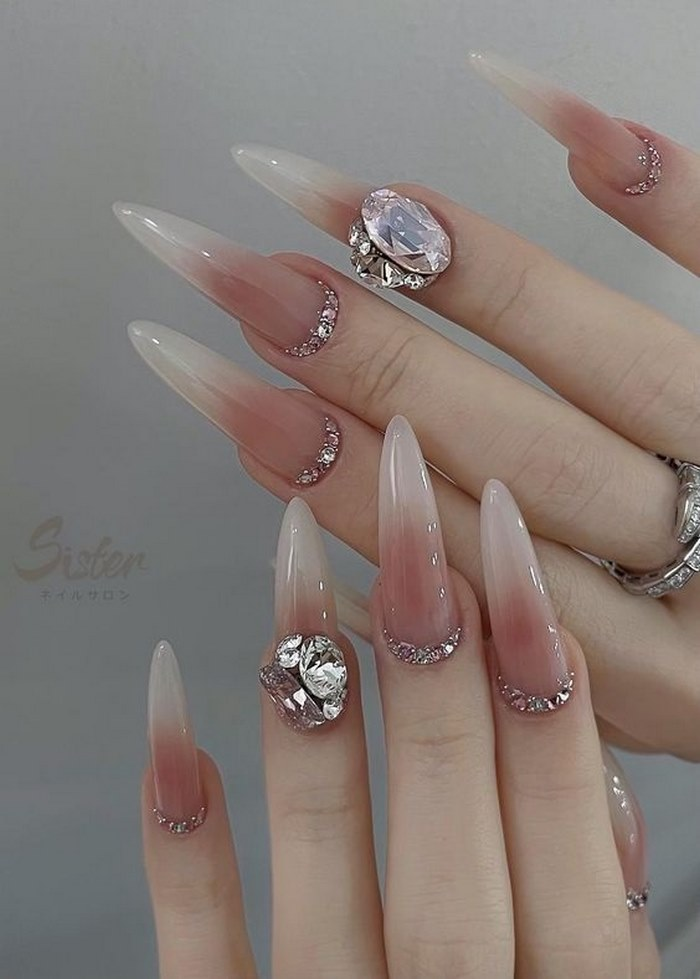 Pointed nails decorated with extremely luxurious stones