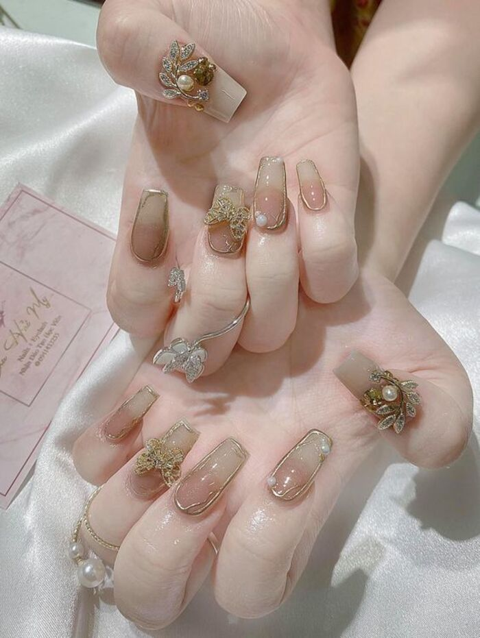 Nude nail design in unique pattern combination