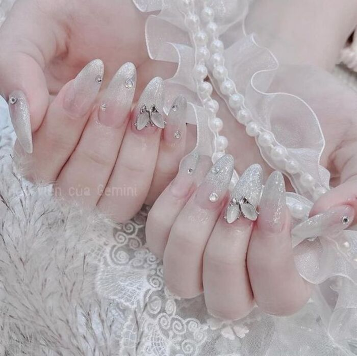 White pointed nail design for wedding day