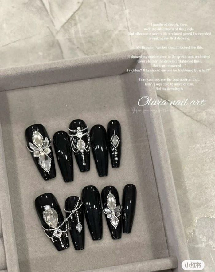Chic black nail designs with black accents, bold styling — design 32