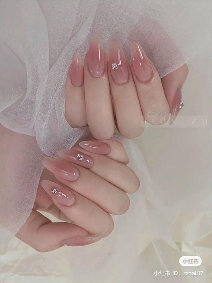Hot pink nails with stones