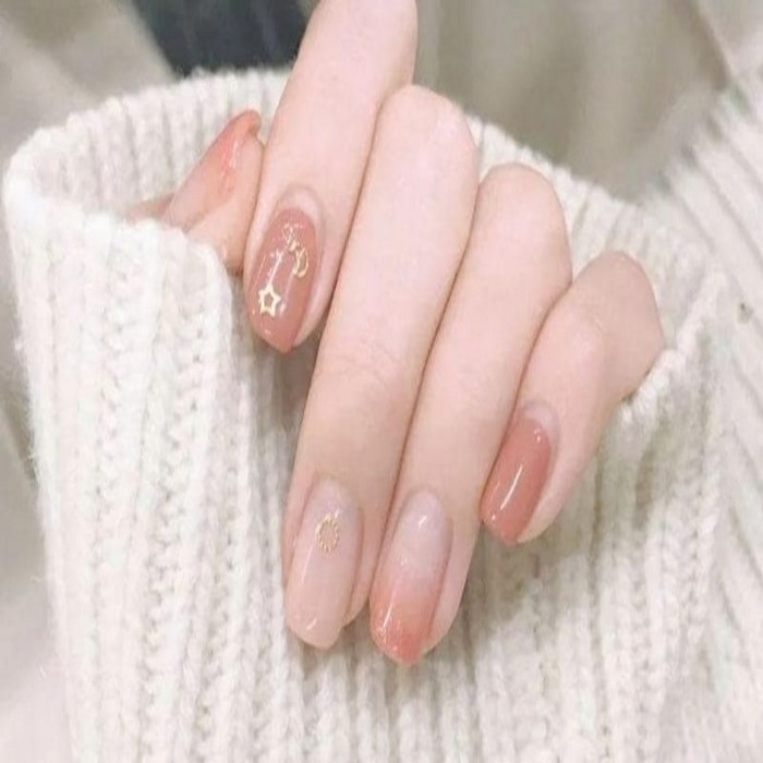 Short round nails with pink and white tones