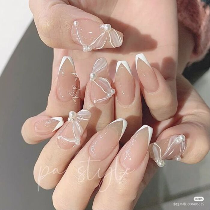 Beautiful wedding day nail style with pearls