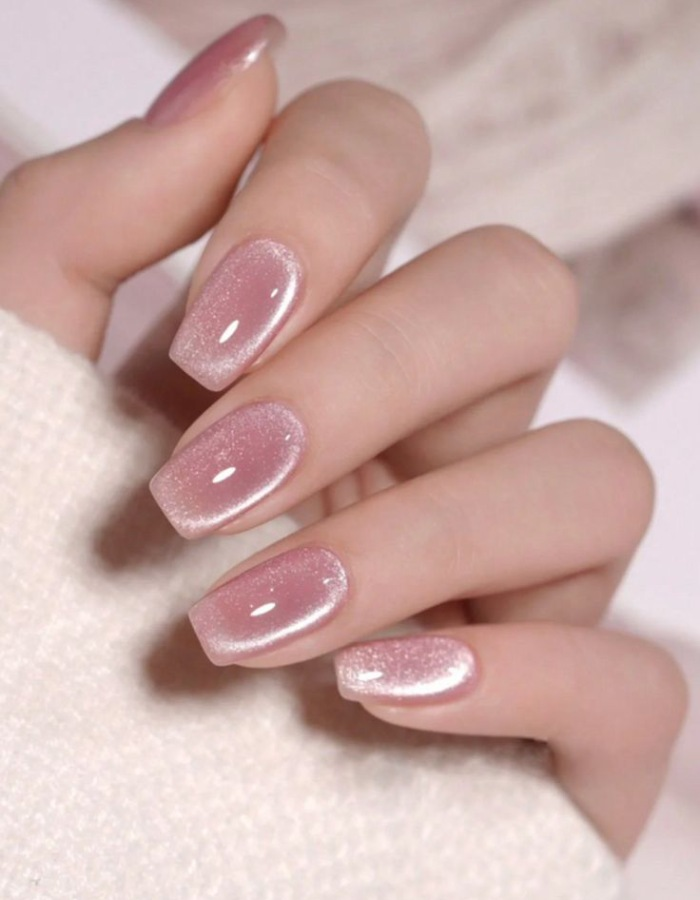 Beautiful jelly-colored nail design with cat's eye pattern for short nails