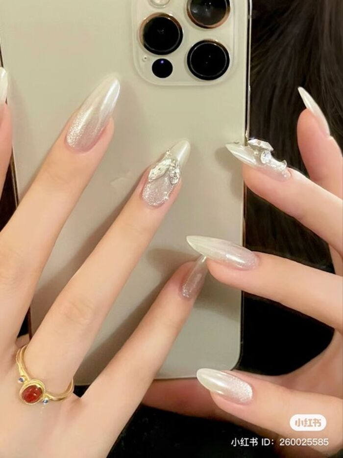 Beautiful 2024 wedding day nail design in milky white color