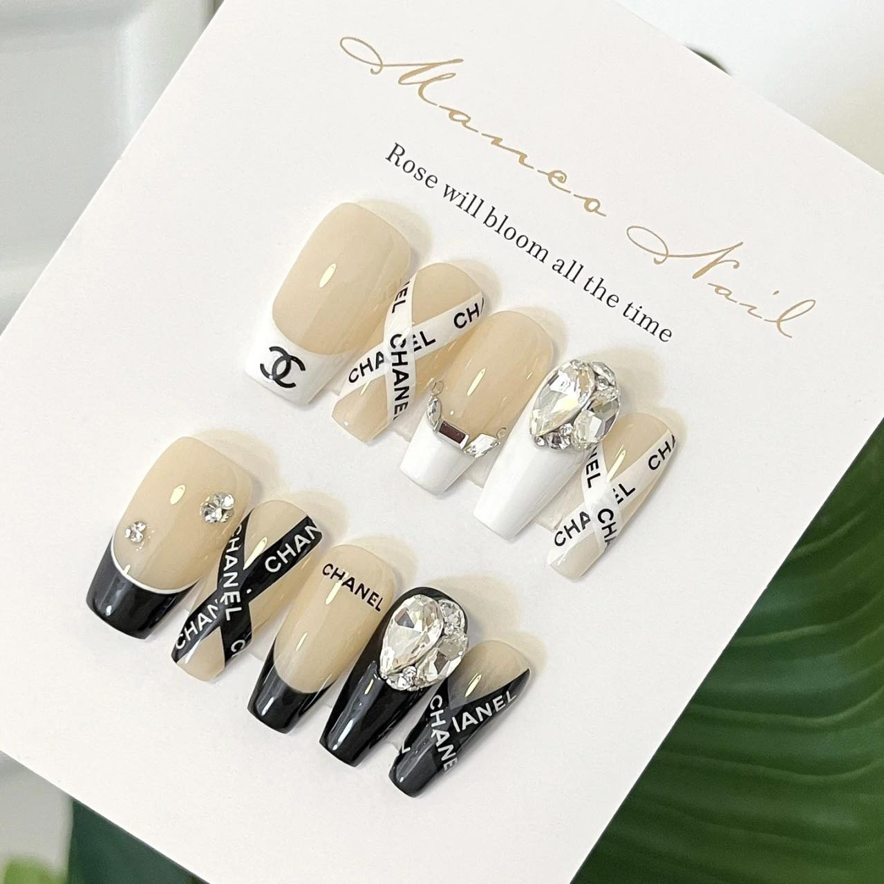 Elegant chanel-inspired nail designs with bold styling — design 15