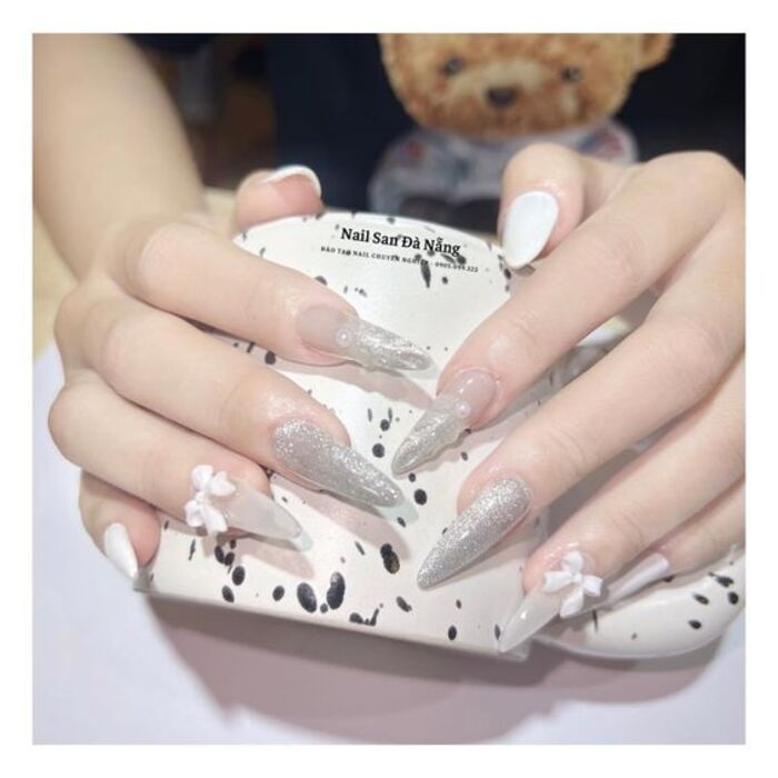White pointed nail design