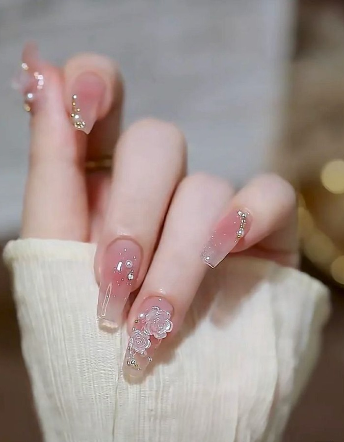 Stone-painted nails with elegant stone flowers