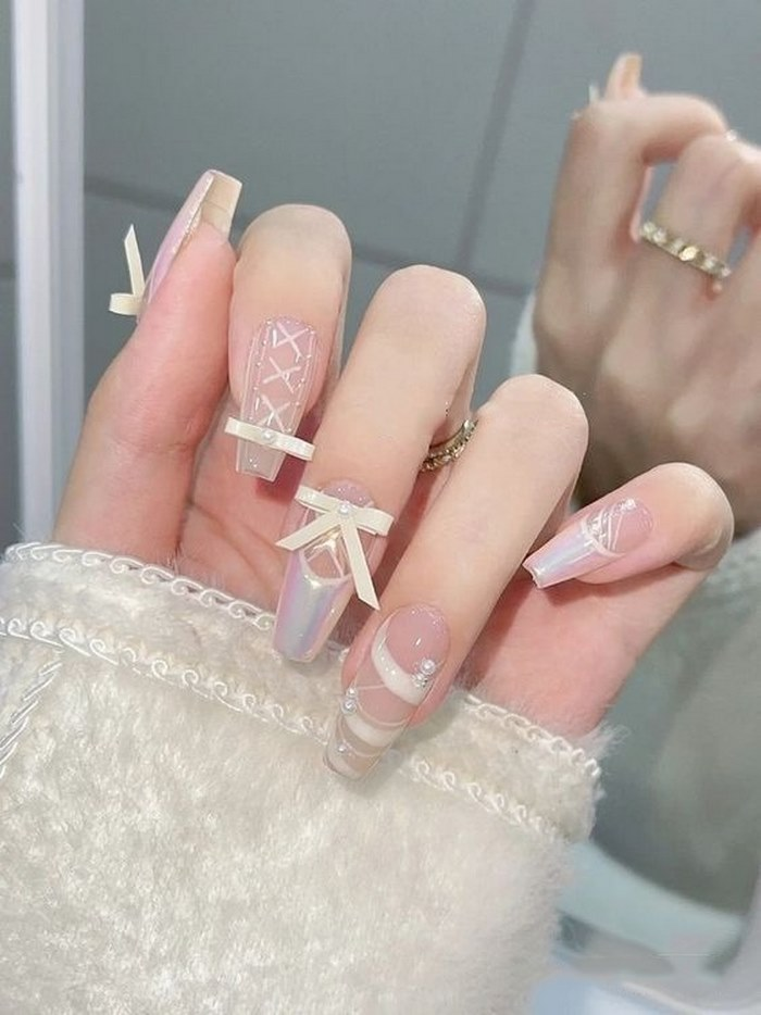 Soft pink jelly nail designs with bow charms — design 20