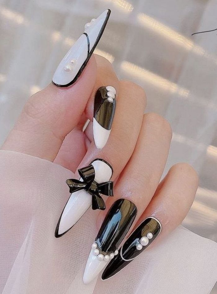 White and black nails have never stopped being hot for her