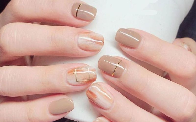 Milky tea-colored nail designs with bold styling — design 5