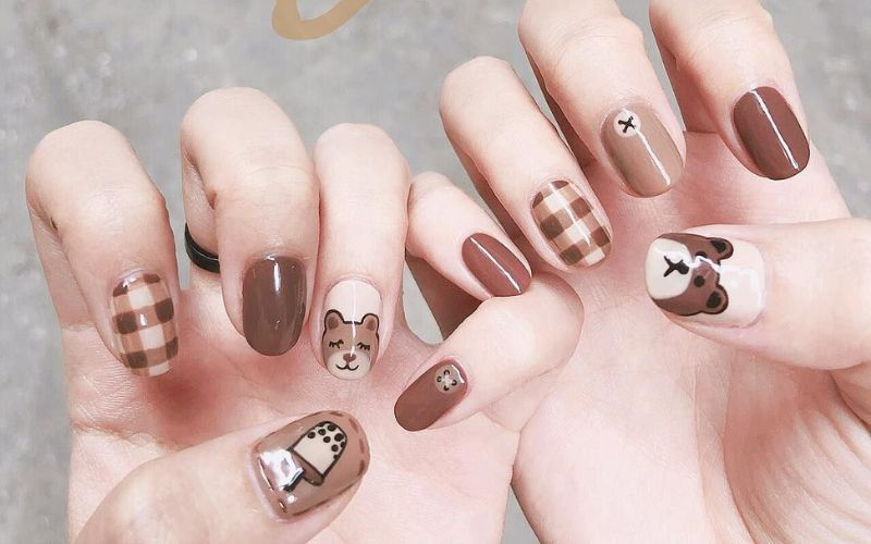 Milky tea-colored nail designs with bold styling — design 3