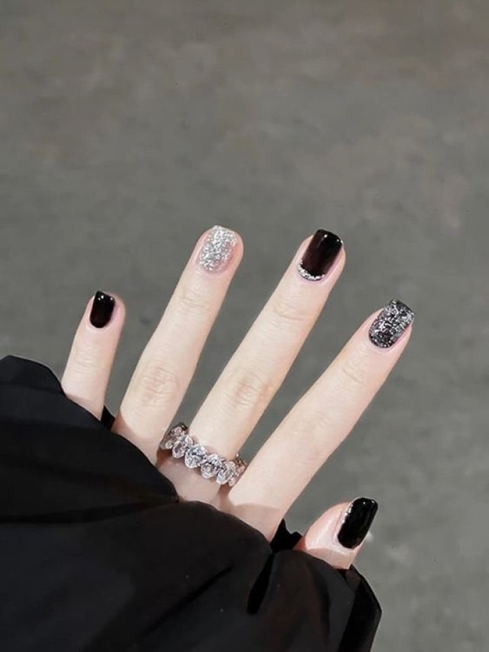 Chic black nail designs with black accents — design 5