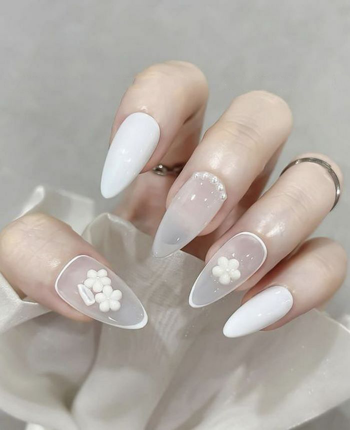 Combine white nail designs with stones